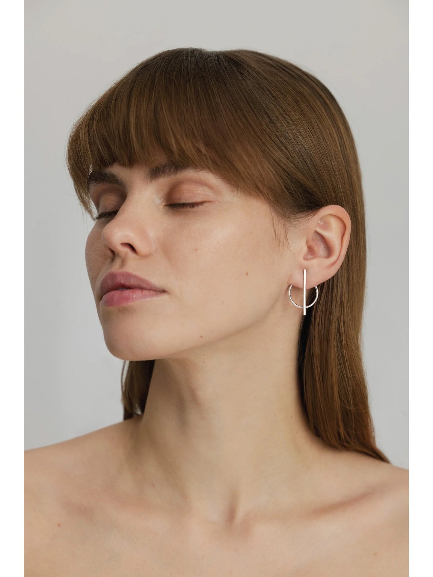 Abstrakts riņķa un joslas auskars