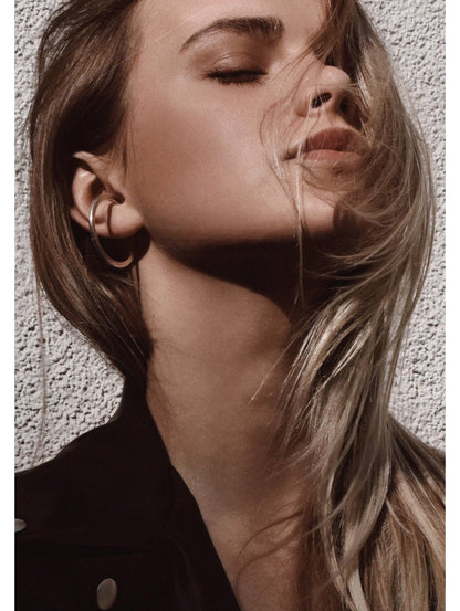 Liels sudraba auskara cuffs – drosmīgs akcents